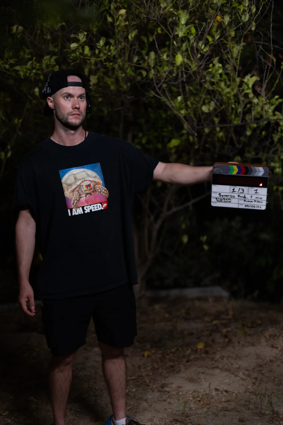 Crew member holding a slate for a night scene